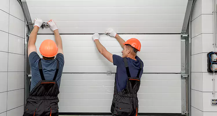 Garage Door Bottom Panel Repair in Poinciana, FL
